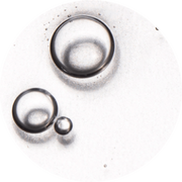 Mala skupina prozirnih mjehurića različitih veličina na bijeloj pozadini.