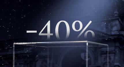Tekstualni prikaz "−40%" ispred zgrade u tamnoj atmosferi.