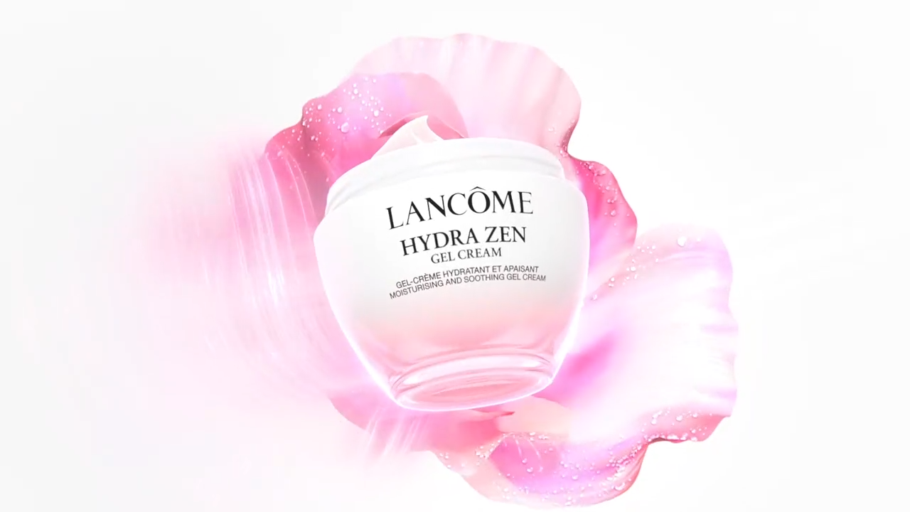 Potpuno bijela posuda s gel kremom Lancôme Hydra Zen na pozadini nježnih ružičastih tonova.